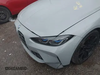 2021 BMW M4 Competition with VIN WBS33AZ03MCG59977, listed as a IAAI auction lot 41012387 with 50,572 mi miles. Bid and sale history available at carsss.com. Image 6.