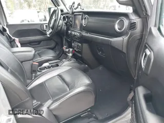2021 Jeep Wrangler Unlimited Sahara with VIN 1C4JJXP64MW720263, listed as a IAAI auction lot 41514302 with 73,300 mi miles and . Bid and sale history available at DreamBid. Image 5.