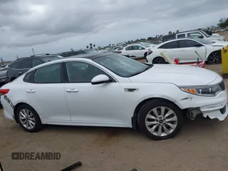 2016 Kia Optima EX with VIN 5XXGU4L31GG086203, listed as a IAAI auction lot 42128099 with 157,988 mi miles. Bid and sale history available at carsss.com. Image 13.