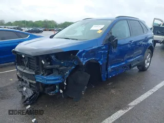 2024 Ford Edge SE z VIN 2FMPK4G93RBA72662, wystawiony jako IAAI lot #42097425 z przebiegiem 7 234 mil mil oraz . Historia ofert i sprzedaży dostępna na DreamBid. Obrazek 19.