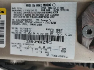2017 Lincoln MKZ Premiere z VIN 3LN6L5A9XHR637903, wystawiony jako Copart lot #51170425 z przebiegiem 102 218 mil mil oraz Szkoda całkowita • Salvage title. Historia ofert i sprzedaży dostępna na DreamBid. Obrazek 12.