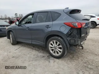 2013 Mazda CX-5 Grand Touring with VIN JM3KE2DE7D0129491, listed as a Copart auction lot 44795725 with 124,487 mi miles and Salvage Title. Bid and sale history available at carsss.com. Image 2.