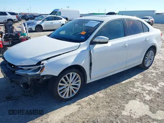 2012 Volkswagen Jetta Sedan SEL w/Sunroof with VIN 3VWLX7AJ4CM323376, listed as a IAAI auction lot 41722977 with 282,535 mi miles. Bid and sale history available at carsss.com. Image 2.
