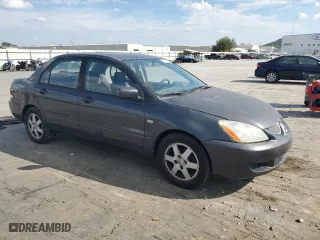 2004 Mitsubishi Lancer LS with VIN JA3AJ36E64U046788, listed as a Copart auction lot 71395384 with 222,288 mi miles and Salvage Title. Bid and sale history available at carsss.com. Image 4.