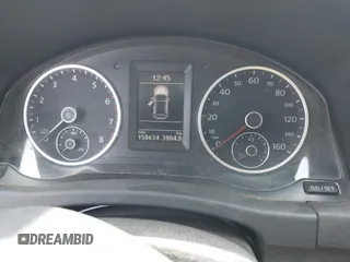 2012 Volkswagen Tiguan LE z VIN WVGAV7AX5CW097459, wystawiony jako IAAI lot #42526659 z przebiegiem 158 634 mil mil oraz . Historia ofert i sprzedaży dostępna na DreamBid. Obrazek 7.