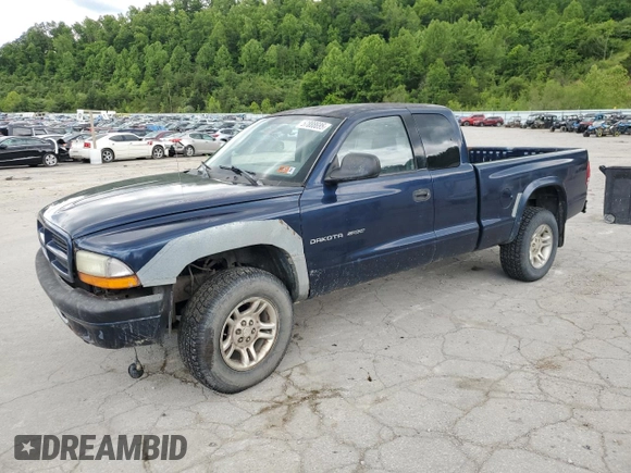 2002 Dodge Dakota z VIN 1B7GG32X32S546515, wystawiony jako Copart lot #57888695 z przebiegiem 81 202 mil mil oraz Szkoda całkowita • Salvage title. Historia ofert i sprzedaży dostępna na DreamBid. Obrazek 1.