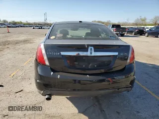 2011 Lincoln MKS z VIN 1LNHL9DR1BG607036, wystawiony jako Copart lot #53512305 z przebiegiem 159 921 mil mil oraz Szkoda całkowita • Salvage title. Historia ofert i sprzedaży dostępna na DreamBid. Obrazek 6.