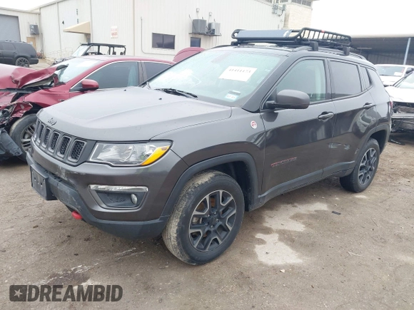 2019 Jeep Compass Trailhawk with VIN 3C4NJDDB1KT739938, listed as a IAAI auction lot 41411173 with 140,396 mi miles and . Bid and sale history available at carsss.com. Image 2.