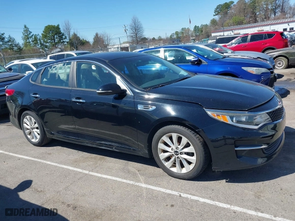 2016 Kia Optima LX with VIN 5XXGT4L3XGG013835, listed as a IAAI auction lot 41815349 with 120,628 mi miles. Bid and sale history available at carsss.com. Image 13.