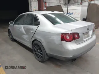 2009 Volkswagen Jetta Sedan SE with VIN 3VWRM71K09M033754, listed as a IAAI auction lot 41949678 with 198,344 mi miles. Bid and sale history available at carsss.com. Image 3.