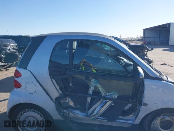 2015 Smart fortwo Passion z VIN WMEEJ3BA4FK788712, wystawiony jako IAAI lot #41219852 z przebiegiem 52 243 mil mil oraz . Historia ofert i sprzedaży dostępna na DreamBid. Obrazek 14.