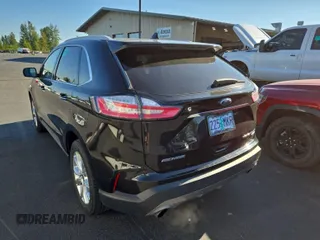 2020 Ford Edge Titanium with VIN 2FMPK3K99LBA73839, listed as a IAAI auction lot 42843885 with 92,381 mi miles and . Bid and sale history available at DreamBid. Image 29.