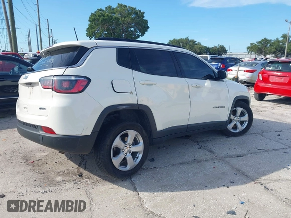 2019 Jeep Compass Altitude with VIN 3C4NJCBB3KT676807, listed as a IAAI auction lot 42595932 with 104,505 mi miles and . Bid and sale history available at DreamBid. Image 4.