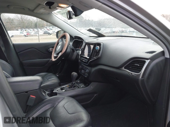 2019 Jeep Cherokee High Altitude with VIN 1C4PJMDX3KD423614, listed as a IAAI auction lot 41395694 with 64,494 mi miles and . Bid and sale history available at DreamBid. Image 5.
