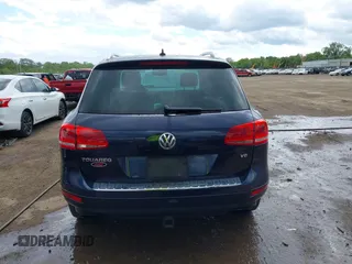 2011 Volkswagen Touareg Sport z VIN WVGFF9BP0BD002958, wystawiony jako IAAI lot #42281009 z przebiegiem 147 801 mil mil oraz . Historia ofert i sprzedaży dostępna na DreamBid. Obrazek 17.