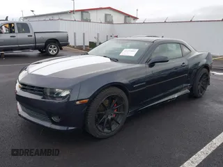 2014 Chevrolet Camaro LT z VIN 2G1FB1E3XE9265155, wystawiony jako IAAI lot #41227609 z przebiegiem 104 786 mil mil oraz . Historia ofert i sprzedaży dostępna na DreamBid. Obrazek 2.