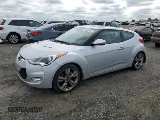 2012 Hyundai Veloster w/Gray Int с VIN KMHTC6AD5CU030984, выставлен на аукционе Copart как лот 49900845 с пробегом 56 427 миль миль и Списание • Salvage title. История ставок и продаж доступна на DreamBid. Изображение 1.