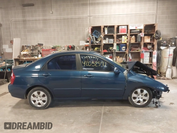 2004 Kia Spectra LX with VIN KNAFE121145012249, listed as a IAAI auction lot 42032571 with 146,748 mi miles. Bid and sale history available at carsss.com. Image 14.