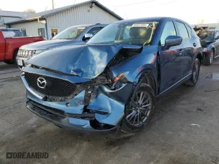 2017 Mazda CX-5 Sport with VIN JM3KFBBL6H0129258, listed as a Copart auction lot 80687694 with 106,120 mi miles and Salvage Title. Bid and sale history available at carsss.com. Image 1.