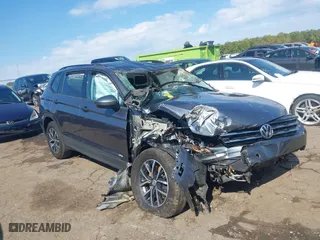 2021 Volkswagen Tiguan S with VIN 3VV1B7AX4MM074898, listed as a IAAI auction lot 40565377 with 1 mi miles. Bid and sale history available at carsss.com. Image 1.