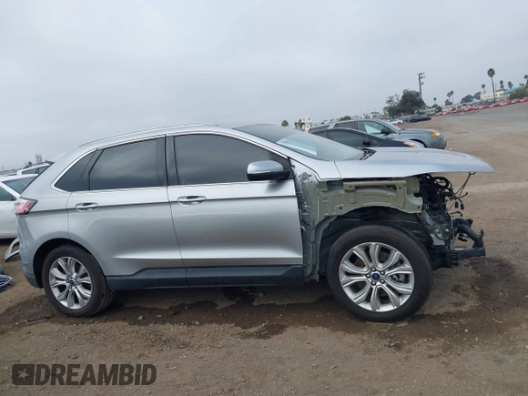 2020 Ford Edge Titanium z VIN 2FMPK4K95LBA16379, wystawiony jako IAAI lot #41190704 z przebiegiem 69 076 mil mil oraz . Historia ofert i sprzedaży dostępna na DreamBid. Obrazek 14.