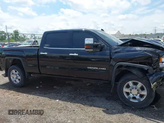2015 GMC Sierra 2500HD Denali with VIN 1GT120E82FF574358, listed as a IAAI auction lot 42377676 with 86,097 mi miles and . Bid and sale history available at DreamBid. Image 13.