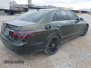 2010 Mercedes-Benz E-Class E 550 Luxury with VIN WDDHF9AB4AA128264, listed as a IAAI auction lot 41842230 with 216,724 mi miles. Bid and sale history available at carsss.com. Image 4.