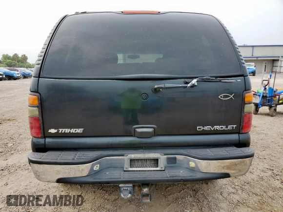 2004 Chevrolet Tahoe LT z VIN 1GNEC13Z84J171857, wystawiony jako Copart lot #57993315 z przebiegiem 239 893 mil mil oraz Szkoda całkowita • Salvage title. Historia ofert i sprzedaży dostępna na DreamBid. Obrazek 6.