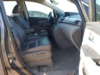 2015 Honda Odyssey EX-L z VIN 5FNRL5H64FB081051, wystawiony jako IAAI lot #42006508 z przebiegiem 154 923 mil mil oraz . Historia ofert i sprzedaży dostępna na DreamBid. Obrazek 5.