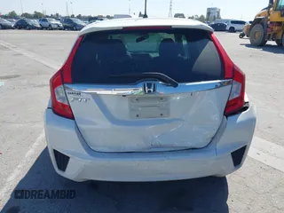 2016 Honda Fit EX with VIN JHMGK5H79GX044411, listed as a IAAI auction lot 41980039 with 203,809 mi miles and . Bid and sale history available at DreamBid. Image 16.