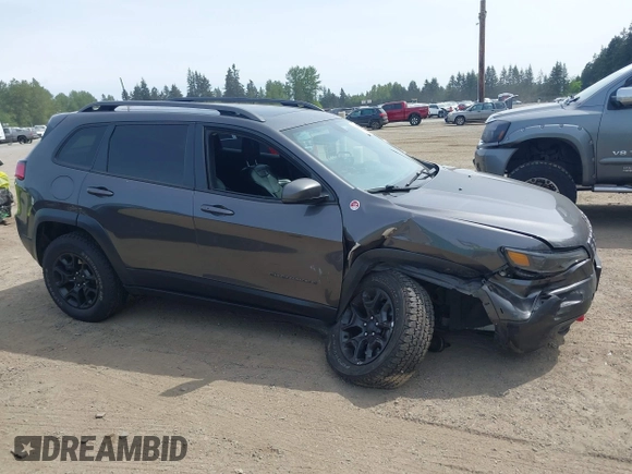 2019 Jeep Cherokee Trailhawk with VIN 1C4PJMBX2KD231734, listed as a IAAI auction lot 42235469 with 104,565 mi miles and . Bid and sale history available at DreamBid. Image 13.