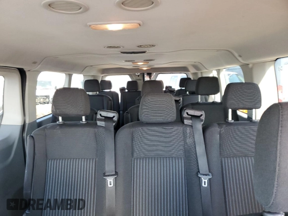 2017 Ford Transit XL z VIN 1FBZX2YM5HKB02355, wystawiony jako Copart lot #54550235 z przebiegiem 76 084 mil mil oraz Szkoda całkowita • Salvage title. Historia ofert i sprzedaży dostępna na DreamBid. Obrazek 10.