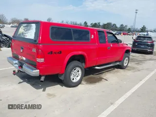 2003 Dodge Dakota z VIN 1D7HG42X93S296117, wystawiony jako IAAI lot #42045149 z przebiegiem 161 725 mil mil oraz . Historia ofert i sprzedaży dostępna na DreamBid. Obrazek 4.