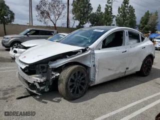 2023 Tesla Model Y Long Range with VIN 7SAYGAEE8PF741715, listed as a Copart auction lot 50960095 with 36,897 mi miles and Salvage Title. Bid and sale history available at carsss.com. Image 1.