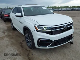 2023 Volkswagen Atlas SEL Premium R-Line z VIN 1V2FE2CA8PC221736, wystawiony jako IAAI lot #42155629 z przebiegiem 54 394 mil mil oraz . Historia ofert i sprzedaży dostępna na DreamBid. Obrazek 1.