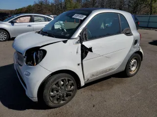 2016 Smart fortwo Passion with VIN WMEFJ5DA7GK126105, listed as a Copart auction lot 50061005 with 34,344 mi miles and Salvage Title. Bid and sale history available at DreamBid. Image 1.