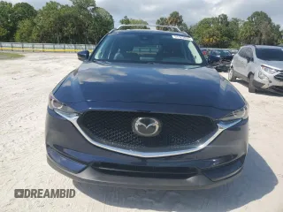 2018 Mazda CX-5 Touring with VIN JM3KFACM5J0419207, listed as a Copart auction lot 51123855 with 75,831 mi miles and Salvage Title. Bid and sale history available at carsss.com. Image 5.