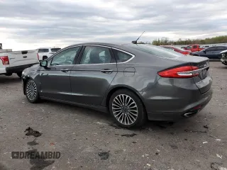 2017 Ford Fusion SE with VIN 3FA6P0H98HR120168, listed as a Copart auction lot 51760235 with 124,791 mi miles and Salvage Title. Bid and sale history available at DreamBid. Image 2.