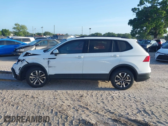 2022 Volkswagen Tiguan S z VIN 3VV1B7AX0NM126321, wystawiony jako IAAI lot #41939646 z przebiegiem 62 309 mil mil oraz . Historia ofert i sprzedaży dostępna na DreamBid. Obrazek 14.