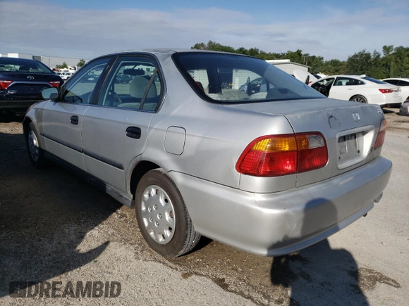 1999 Honda Civic LX with VIN 2HGEJ6678XH560446, listed as a Copart auction lot 56669794 with 197,100 mi miles and Non Repairable. Bid and sale history available at carsss.com. Image 2.