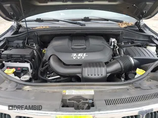 2013 Jeep Grand Cherokee Laredo with VIN 1C4RJEAG2DC571569, listed as a IAAI auction lot 41100518 with 98,265 mi miles. Bid and sale history available at carsss.com. Image 10.