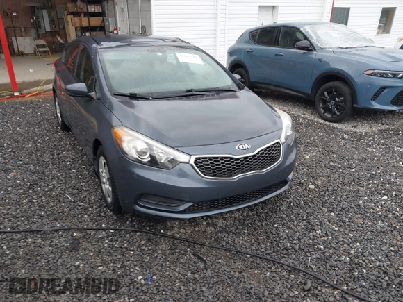 2016 Kia Forte LX with VIN KNAFK4A69G5560835, listed as a IAAI auction lot 42003212 with 100,873 mi miles. Bid and sale history available at carsss.com. Image 1.
