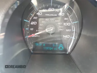 2011 Ford Taurus SEL z VIN 1FAHP2EWXBG190610, wystawiony jako Copart lot #56993785 z przebiegiem 119 784 mil mil oraz Szkoda całkowita • Salvage title. Historia ofert i sprzedaży dostępna na DreamBid. Obrazek 9.