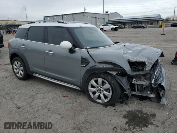 2017 MINI Countryman Cooper with VIN WMZYS7C31H3E06457, listed as a Copart auction lot 49351315 with 77,461 mi miles and Salvage title. Bid and sale history available at DreamBid. Image 4.