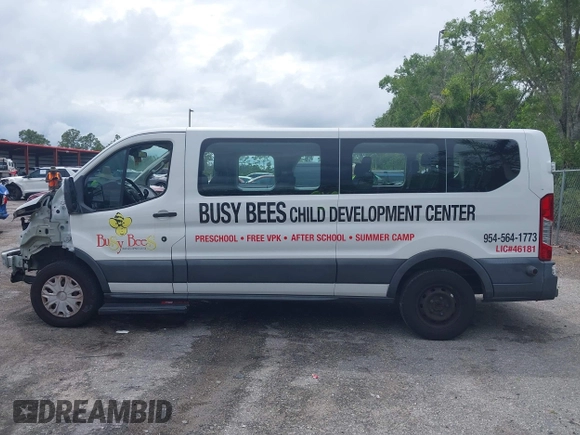 2018 Ford Transit Passenger XL with VIN 1FBZX2ZM0JKA10221, listed as a IAAI auction lot 41988879 with 54,340 mi miles and . Bid and sale history available at DreamBid. Image 14.