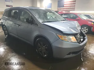 2013 Honda Odyssey EX-L with VIN 5FNRL5H64DB080141, listed as a Copart auction lot 49553235 with 128,358 mi miles and Salvage Title. Bid and sale history available at carsss.com. Image 4.