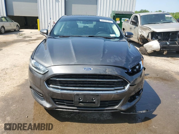 2015 Ford Fusion SE with VIN 3FA6P0HD6FR272418, listed as a Copart auction lot 60294105 with 128,916 mi miles and Salvage title. Bid and sale history available at DreamBid. Image 5.
