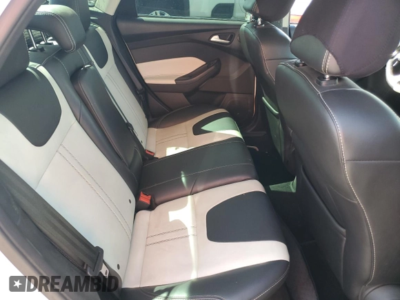2014 Ford Focus Titanium with VIN 1FADP3J26EL132223, listed as a Copart auction lot 71490004 with 131,233 mi miles and Salvage Title. Bid and sale history available at DreamBid. Image 10.