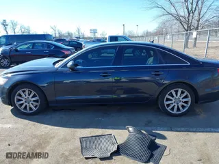 2014 Audi A6 2.0T Premium Plus with VIN WAUGFAFC4EN133050, listed as a IAAI auction lot 41625553 with 130,251 mi miles. Bid and sale history available at carsss.com. Image 14.