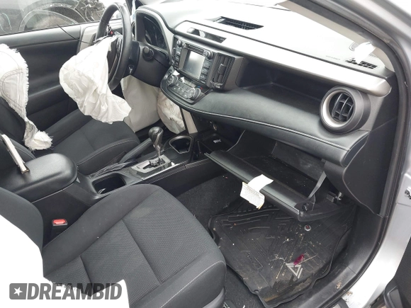 2018 Toyota RAV4 XLE with VIN 2T3RFREV1JW718474, listed as a IAAI auction lot 42144572 with 62,852 mi miles and . Bid and sale history available at DreamBid. Image 5.